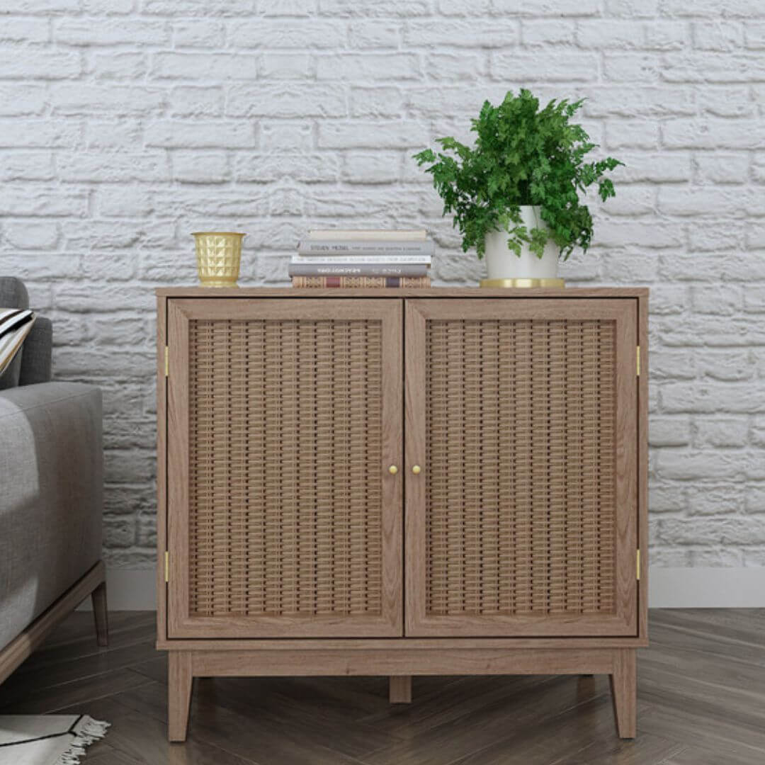 Oak coloured 2 door sideboard with rattan fronts and gold handles.