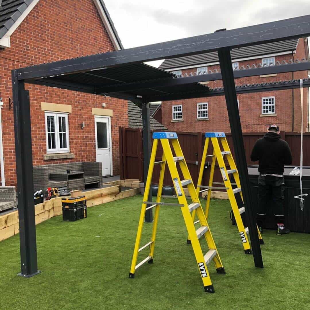 Aluminium pergola being installed.