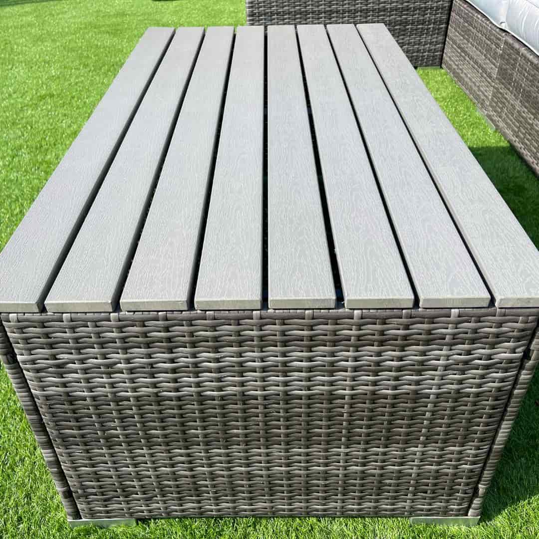 Close up of a grey rattan coffee table #colour_grey