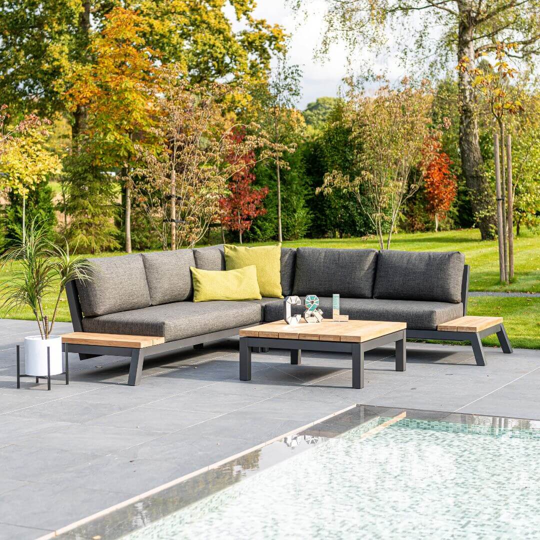 Anthracite aluminium corner sofa and a matching coffee table with teak table top.