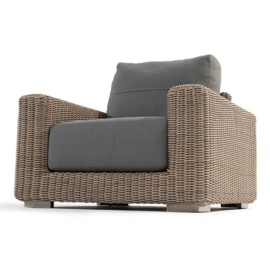 Beige rattan wicker armchair.