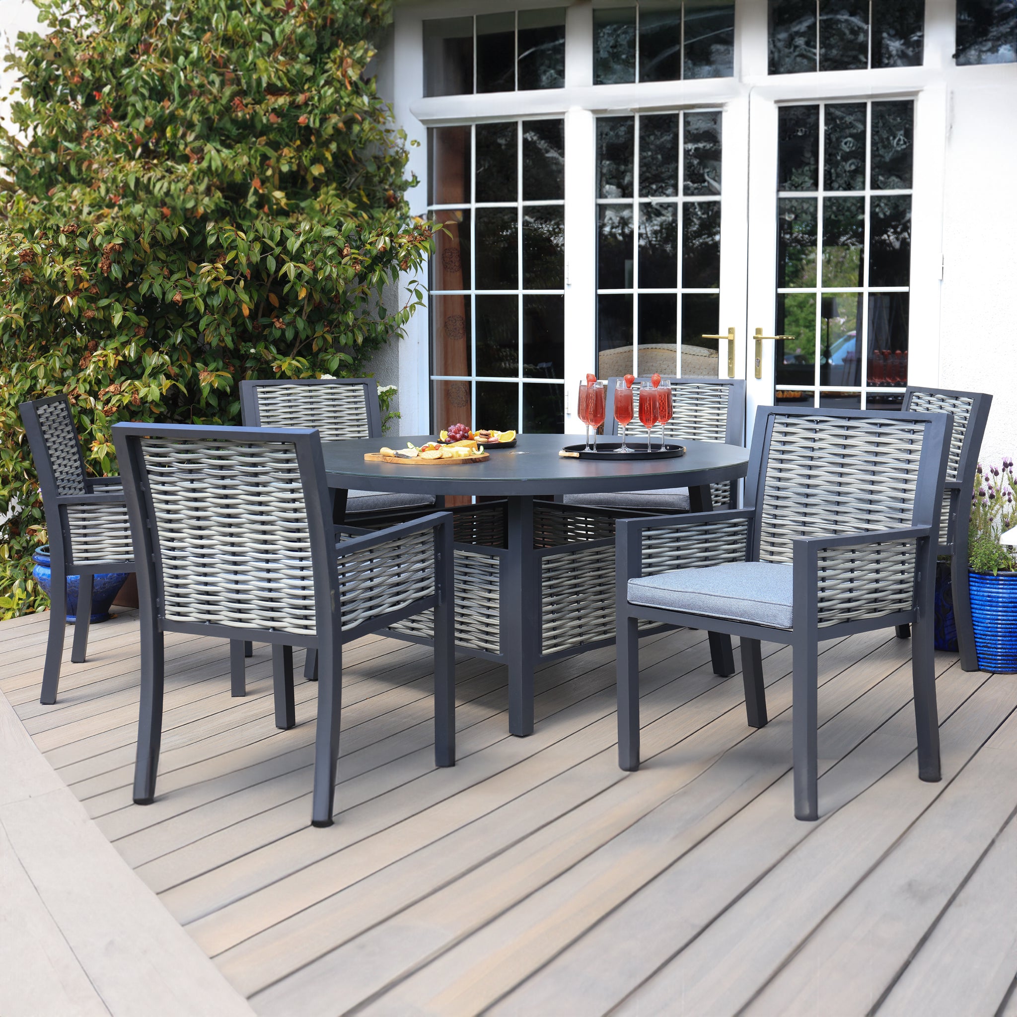 Aluminium / Rattan Weave 6 Seat Circular Dining Set
