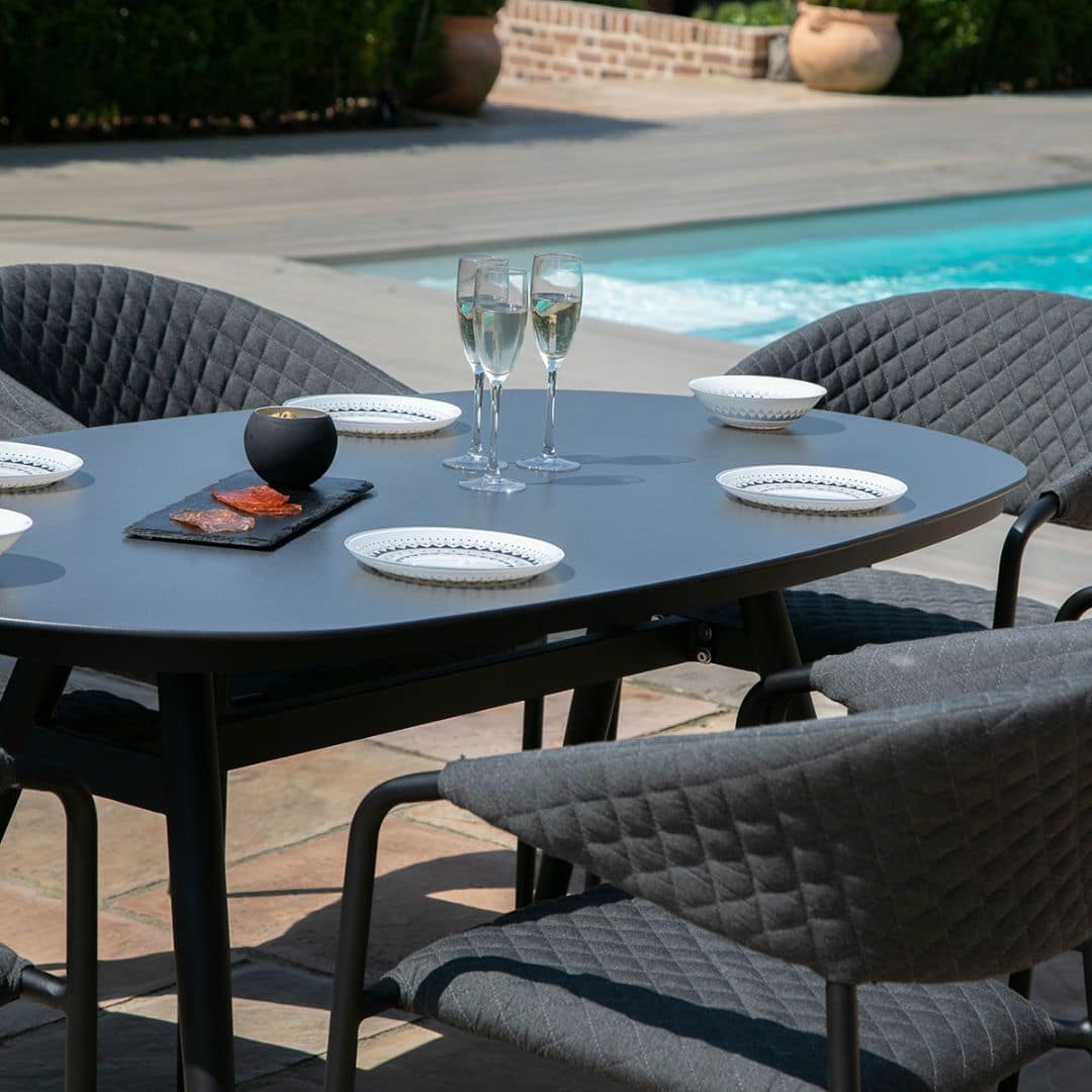 Fabric 6 seat oval dining set with quilted chairs #colour_charcoal