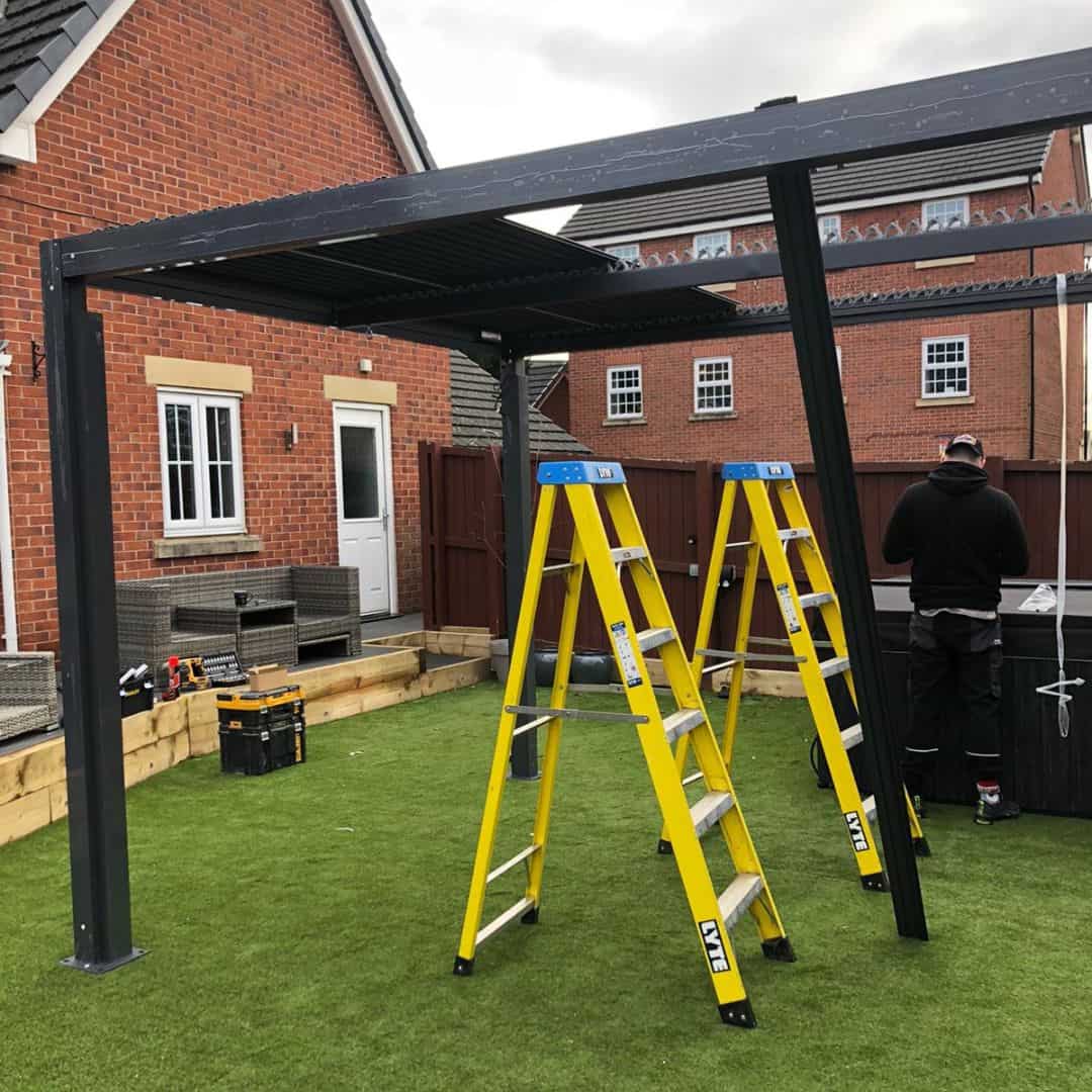 Aluminium pergola being installed.