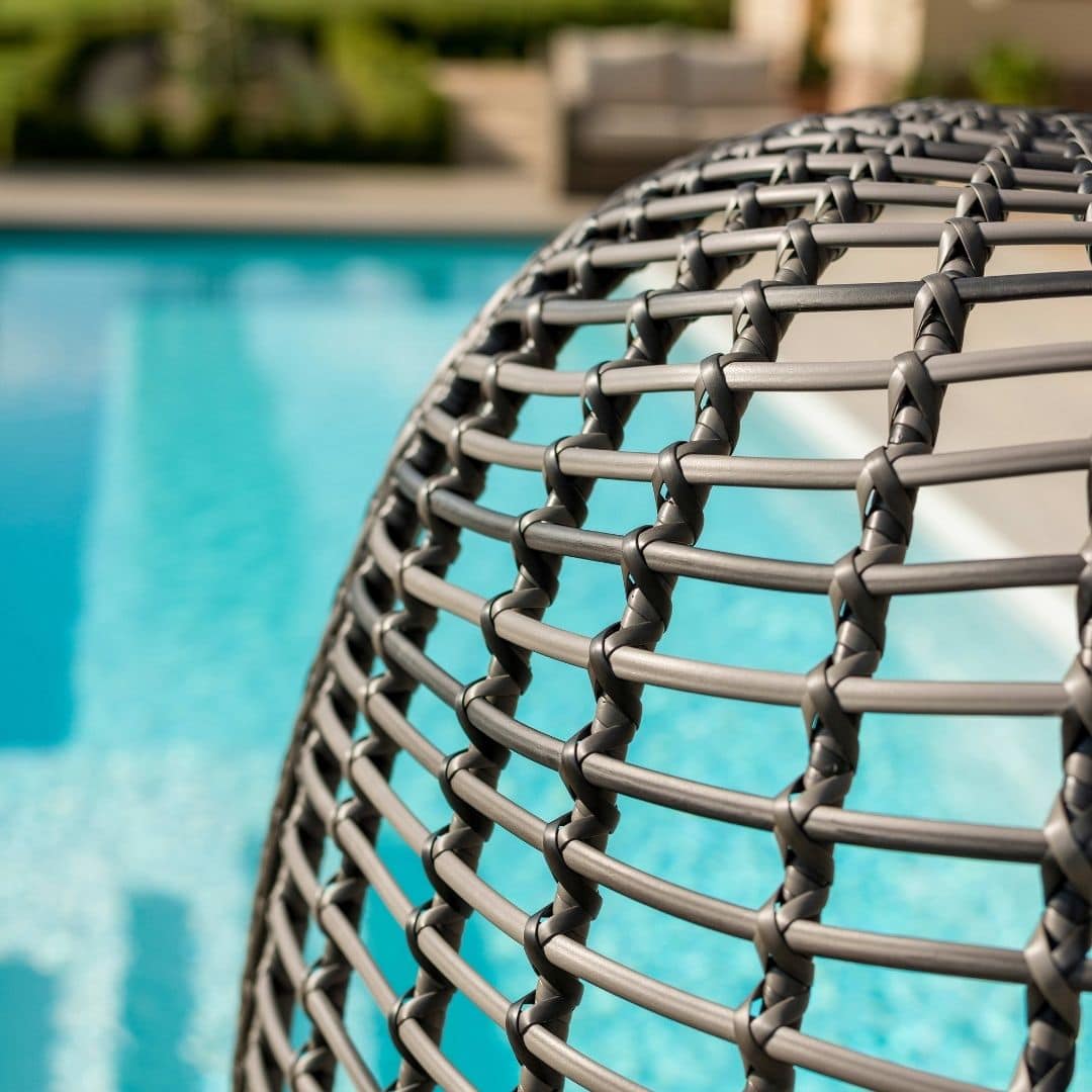 Close up of a rattan pod chair #colour_grey