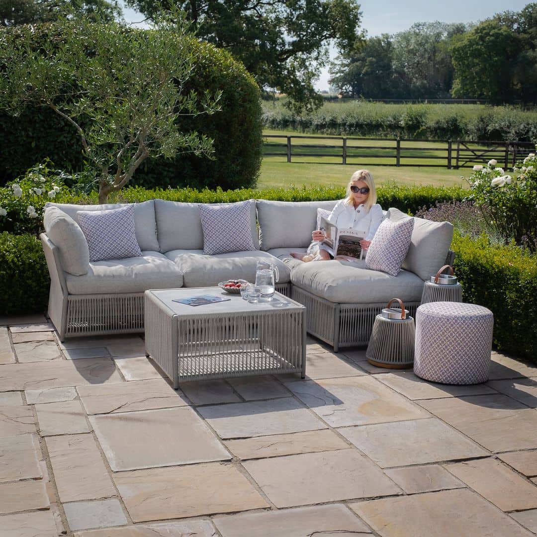 Light grey coloured rope weave corner sofa set with matching coffee table.