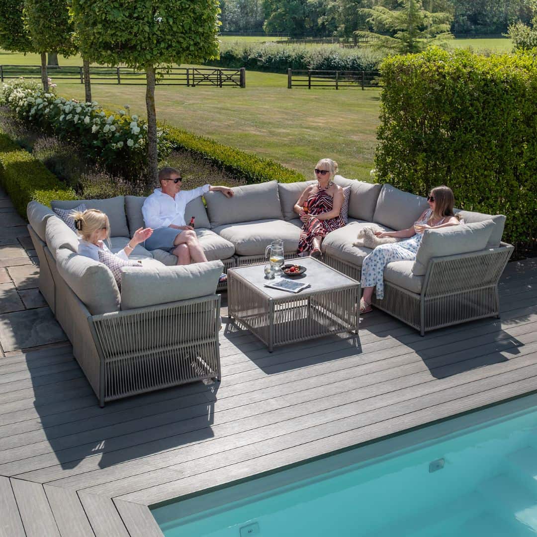 Light grey coloured rope weave u shape sofa with matching coffee table.