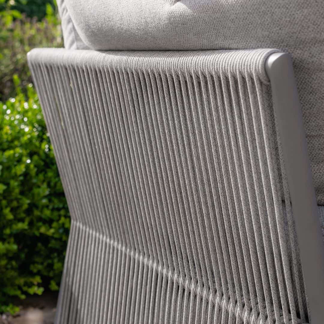 Light grey coloured rope weave u shape sofa with matching coffee table.