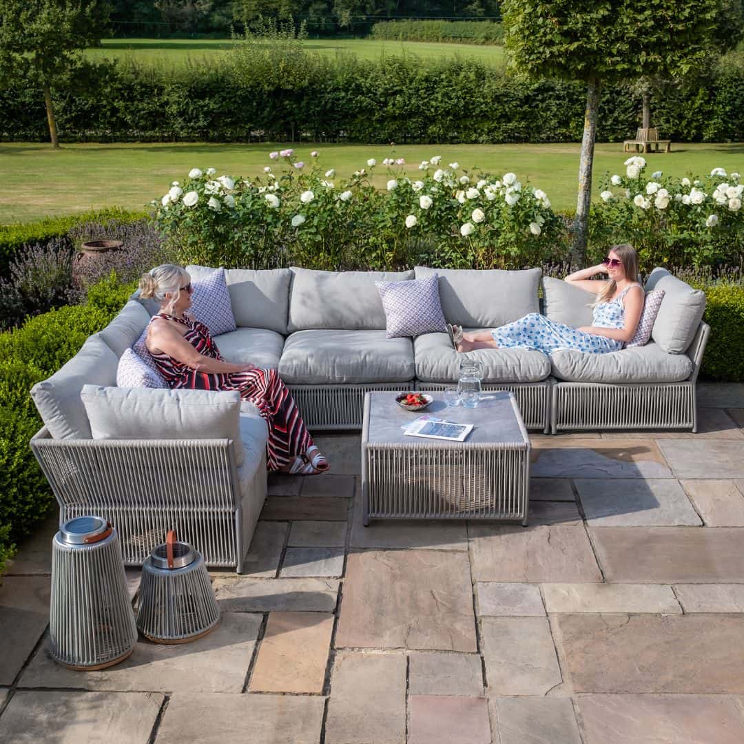 Light grey coloured rope weave corner sofa set with matching coffee table.