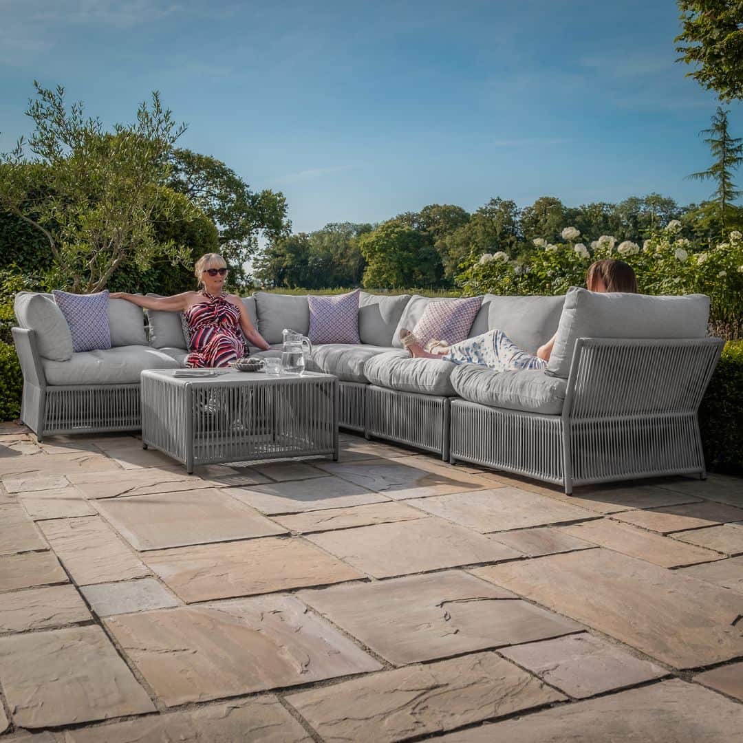 Light grey coloured rope weave corner sofa set with matching coffee table.