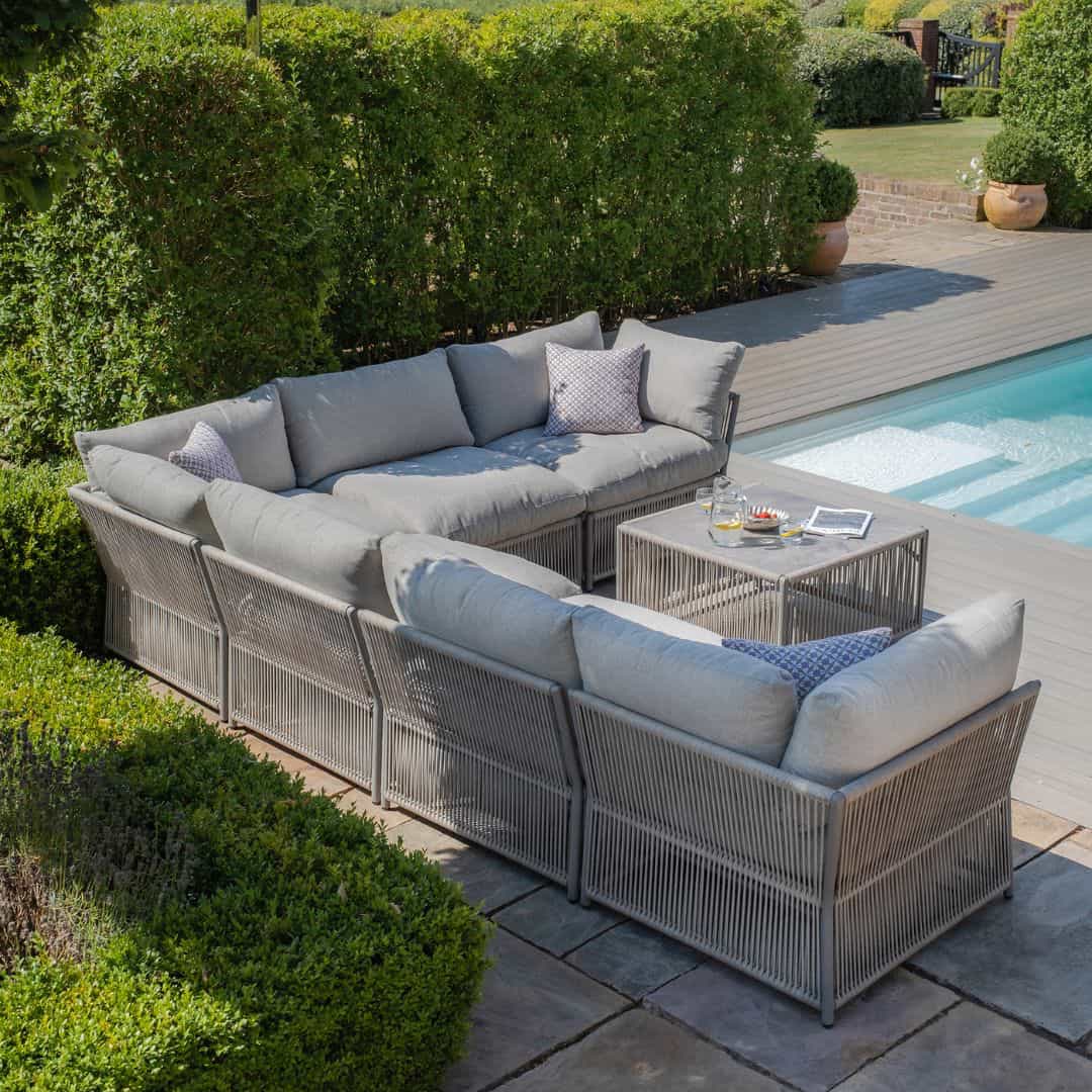 Light grey coloured rope weave corner sofa set with matching coffee table.