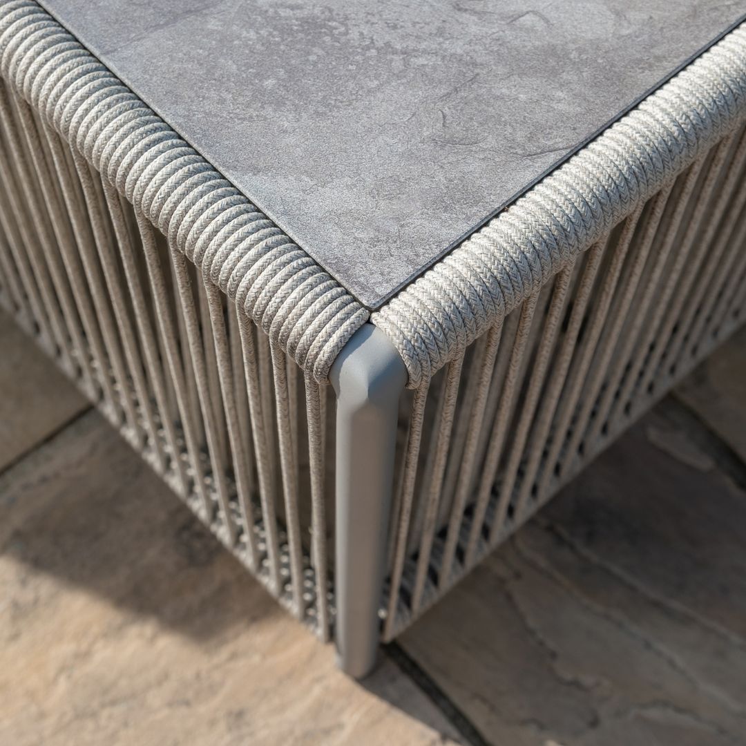 Light grey coloured rope weave corner sofa set with matching coffee table.