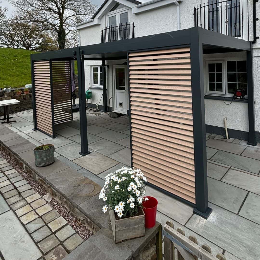 1.3m Light Oak aluminium adjustable louvred side panel on a aluminium pergola