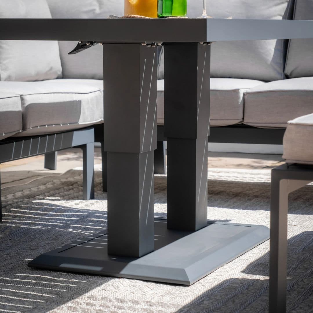 Aluminium corner sofa dining set with rising table and 2 stools.