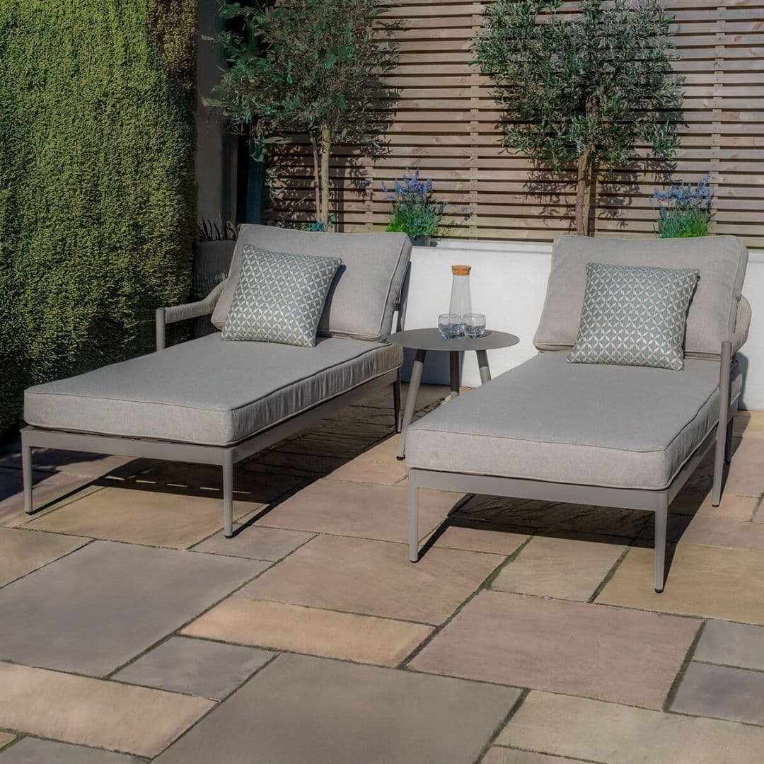 Cool linen with dawn grey frame pair of sun loungers with matching side table.