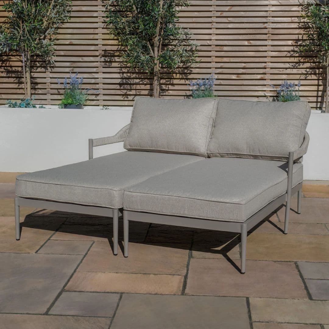 Cool linen with dawn grey frame pair of sun loungers with matching side table.