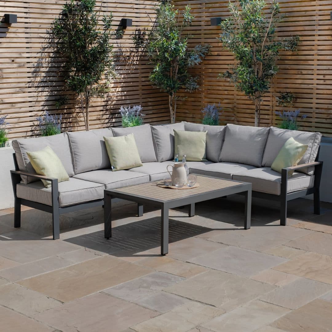 Aluminium corner sofa dining set with coffee table.