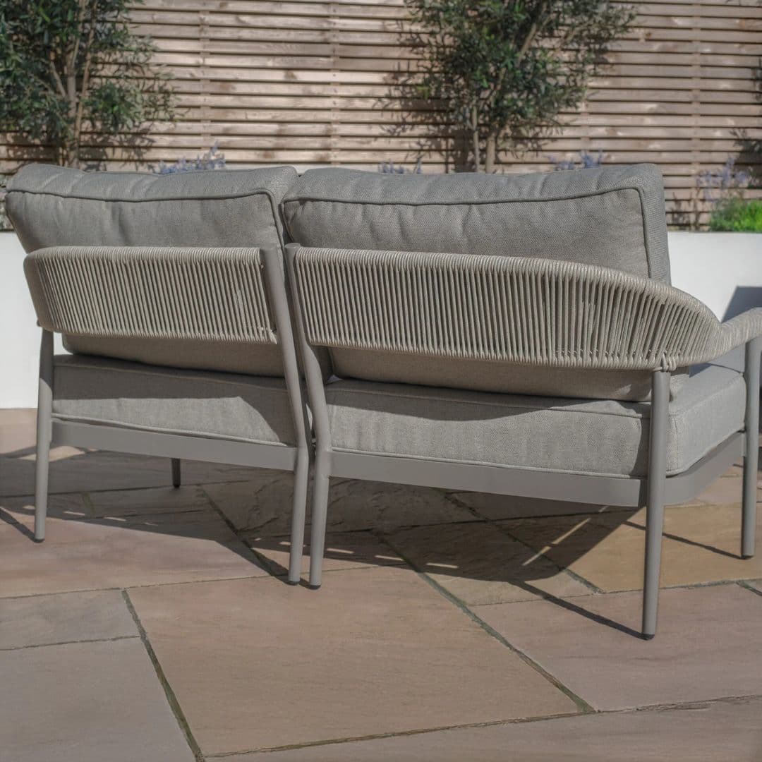 Cool linen with dawn grey frame pair of sun loungers with matching side table.