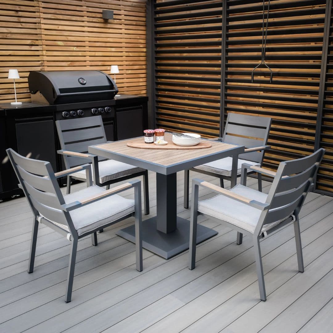 4 seat square aluminium dining set with wood effect arms and table top.