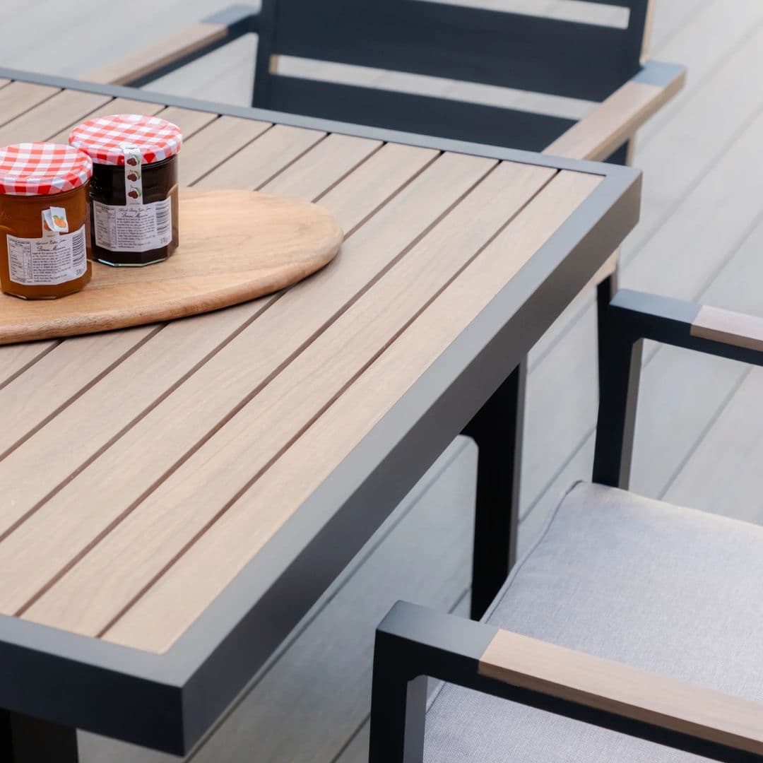 4 seat square aluminium dining set with wood effect arms and table top.