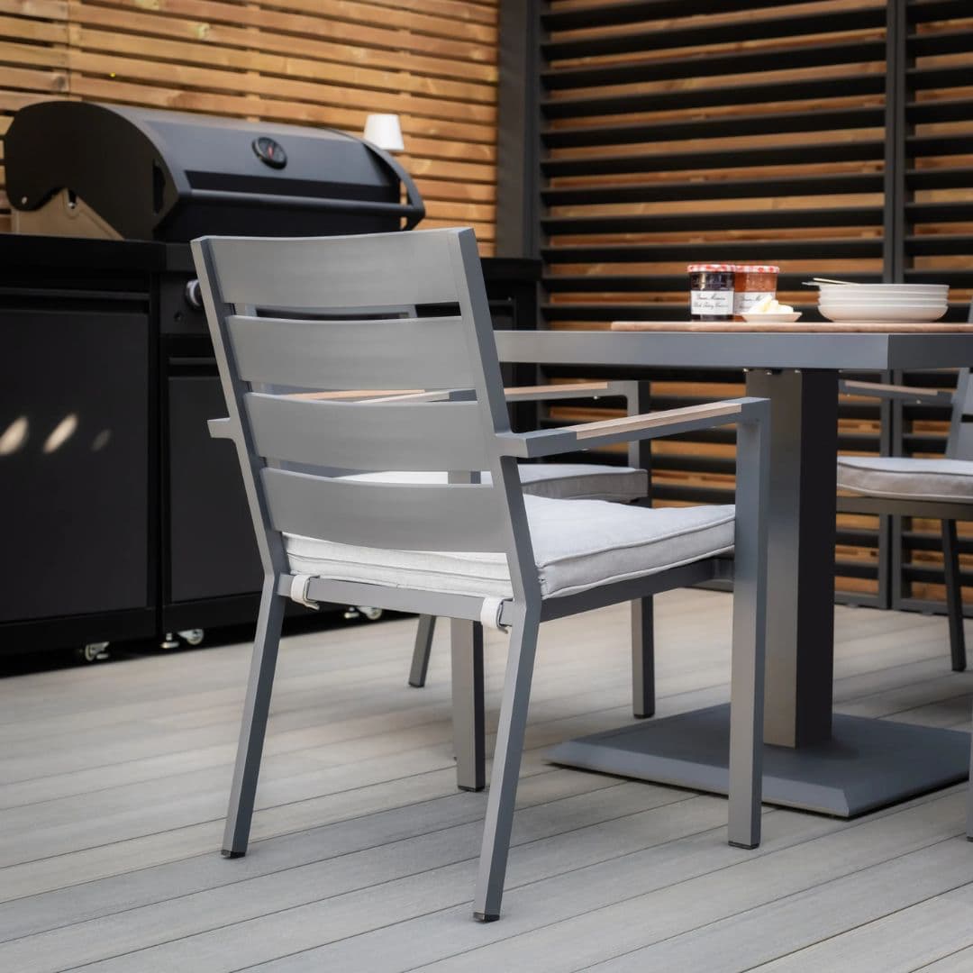 4 seat square aluminium dining set with wood effect arms and table top.