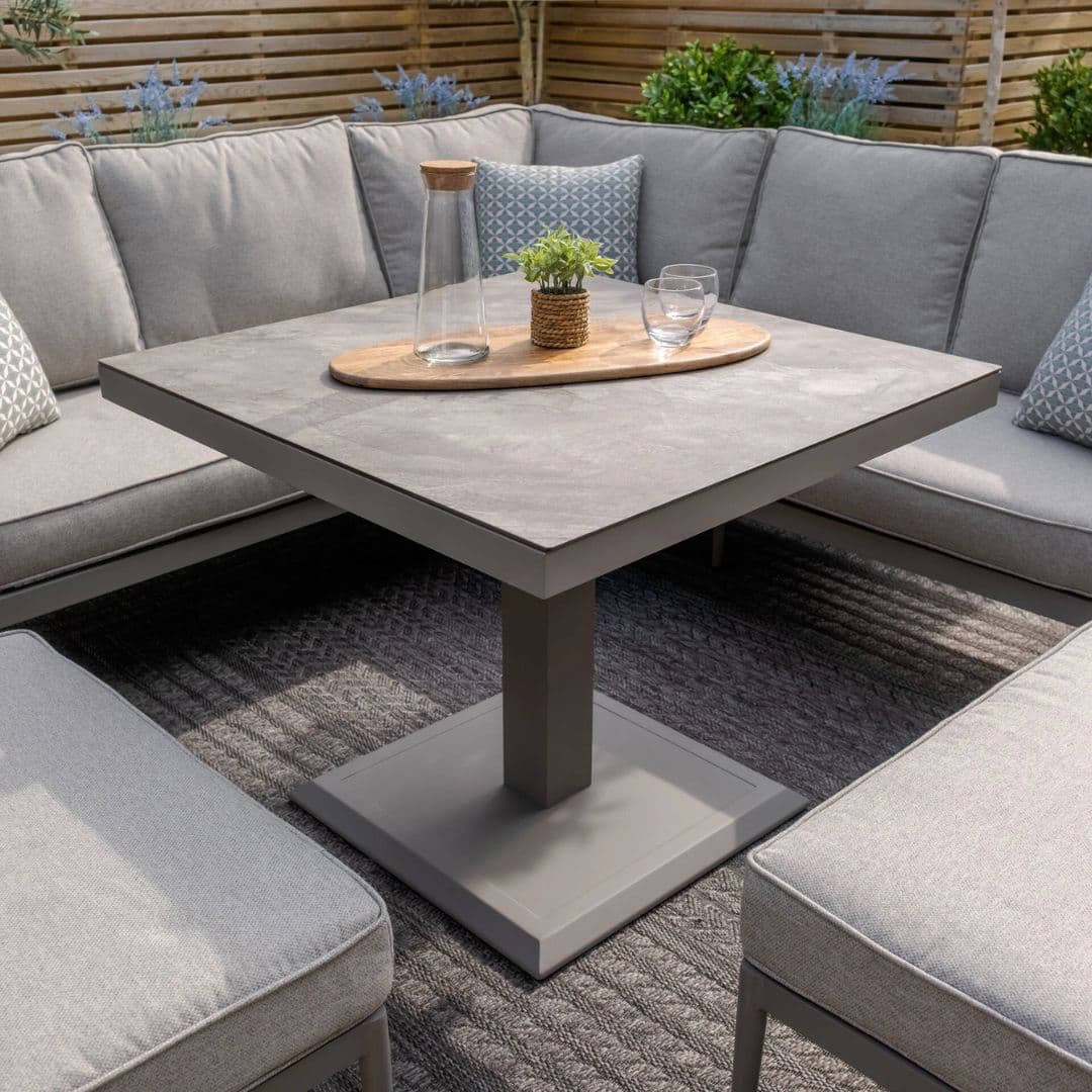 Cool Linen rope weave casual dining set with rising table and matching stools.