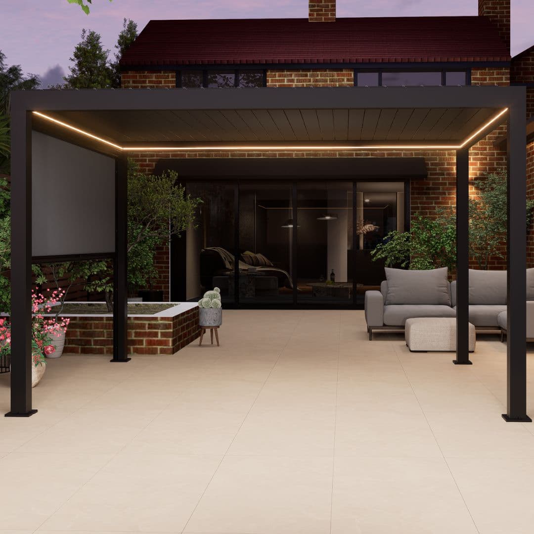 Aluminium pergola with textile privacy screen and white led lighting.