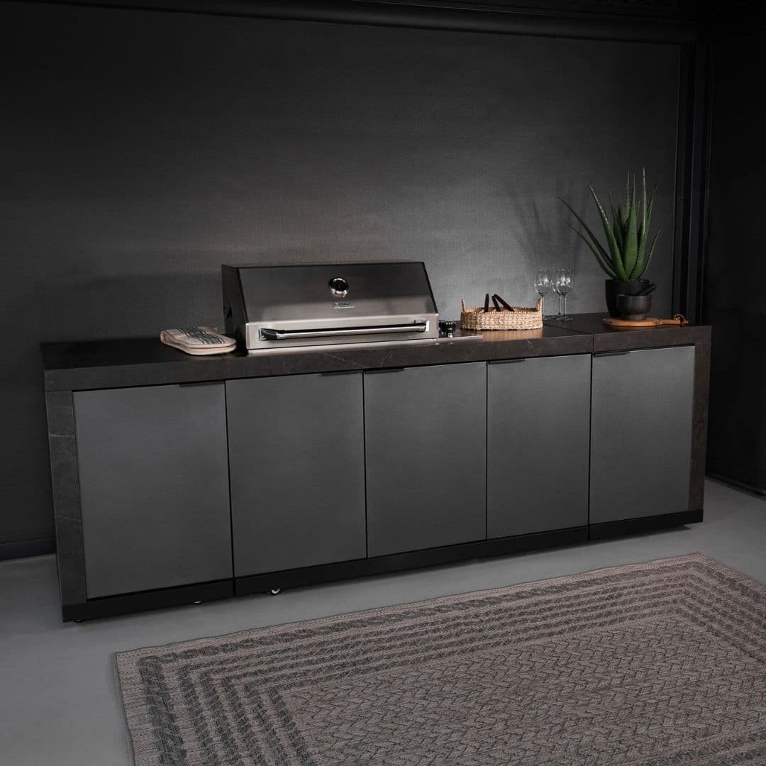 Grey outdoor kitchen unit with a bbq top unit.