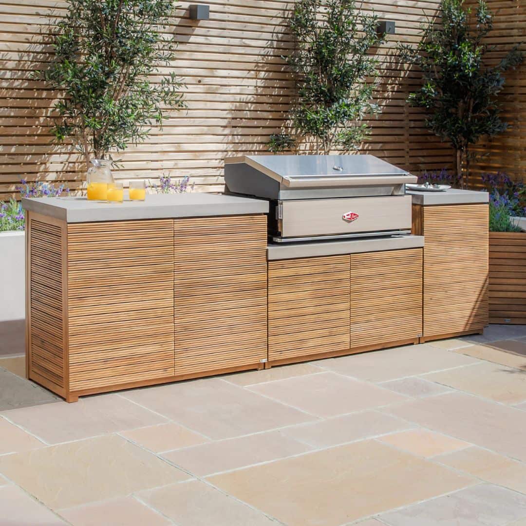 Acacia wood and a composite concrete worktop outdoor kitchen unit.
