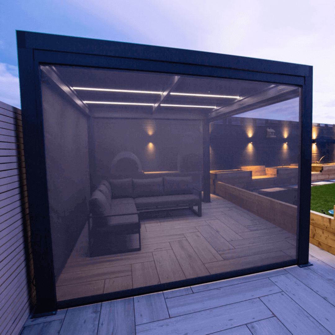 Textilene pull down privacy screens attached to a grey aluminium pergola.