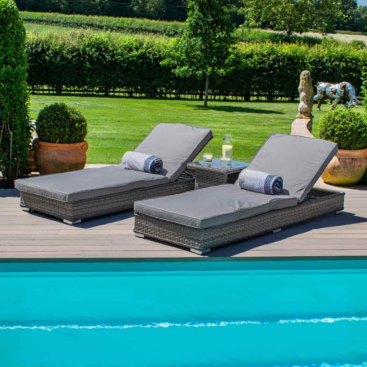 Grey rattan double sunlounger set with side table