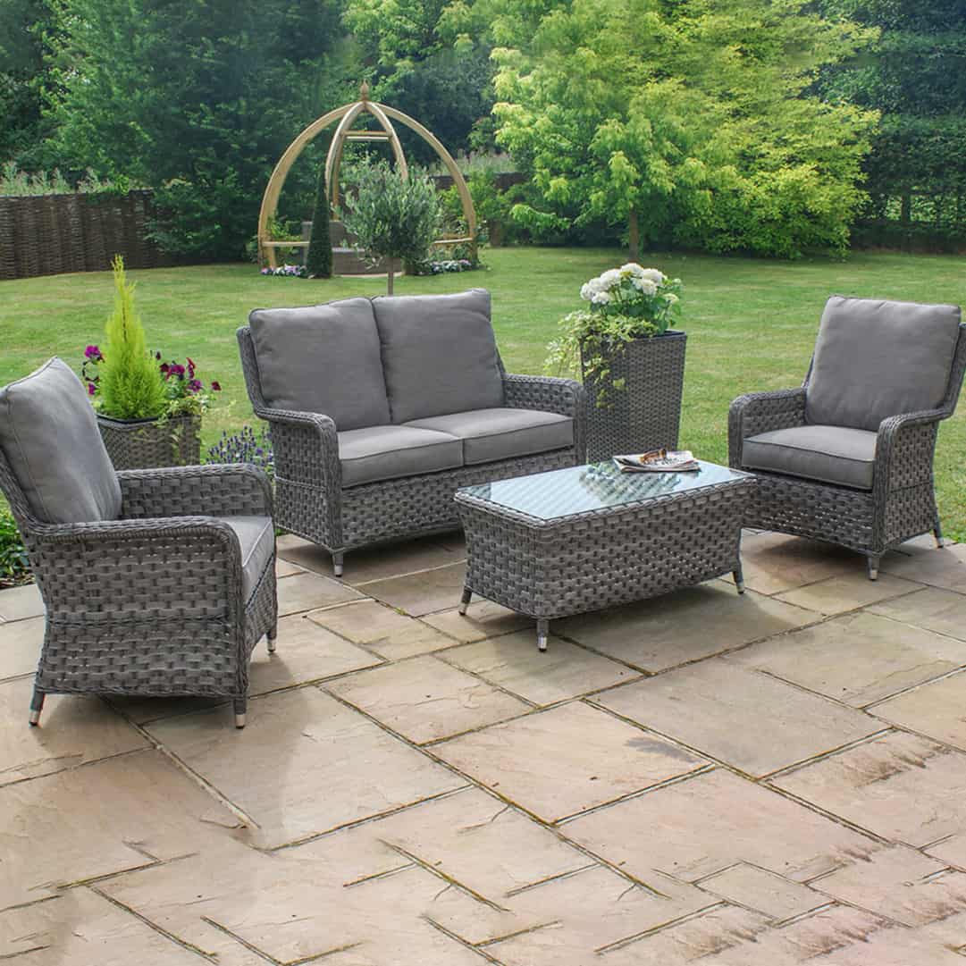 Grey rattan high back 2 seat sofa set with two chairs and a matching coffee table