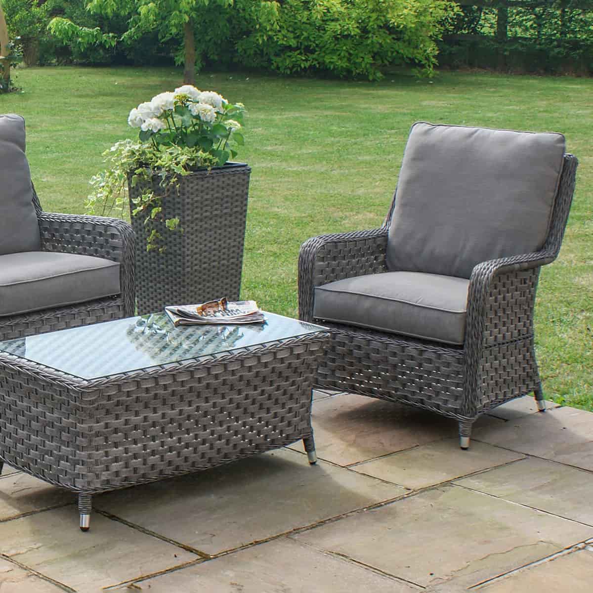 Grey rattan high back 2 seat sofa set with two chairs and a matching coffee table