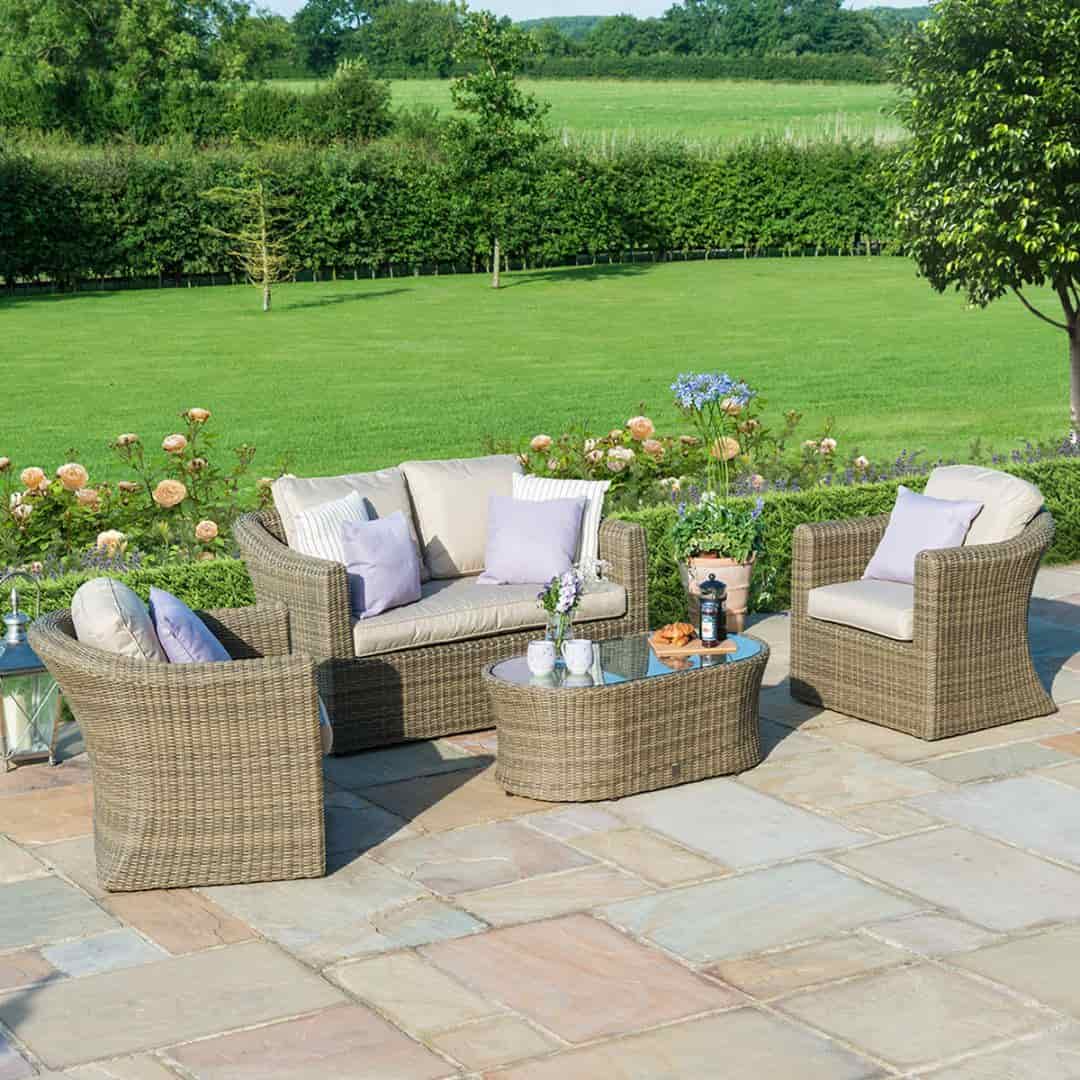 Natural coloured rattan 2 seat sofa set with two armchairs and matching coffee table