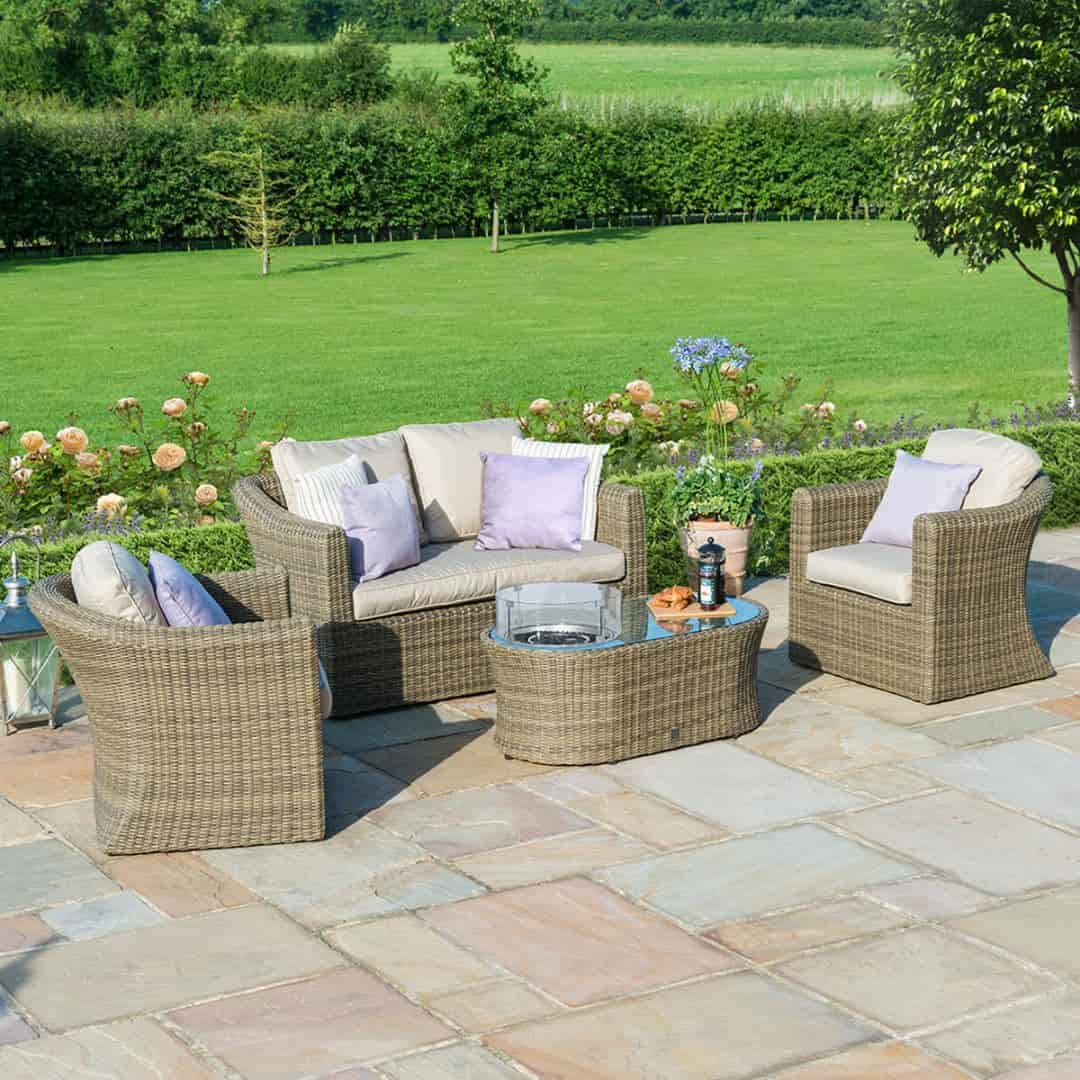 Natural coloured rattan 2 seat sofa set with two armchairs and fire pit table