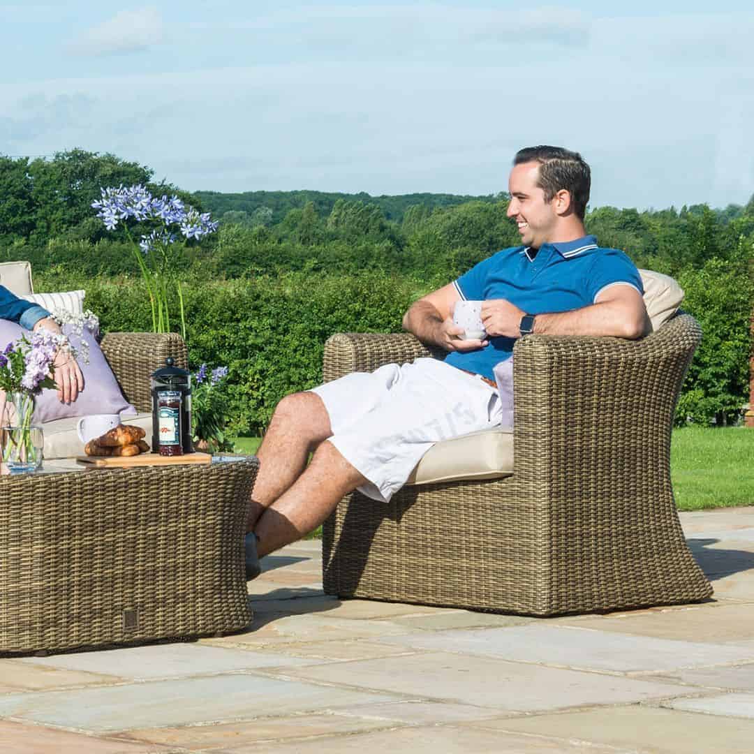 Natural coloured rattan 2 seat sofa set with two armchairs and fire pit table