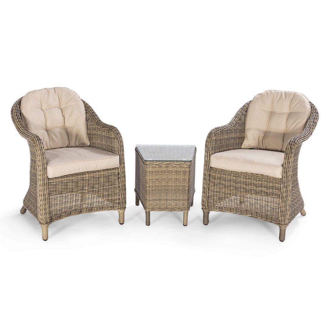 Natural coloured rattan lounge chair set with small square table