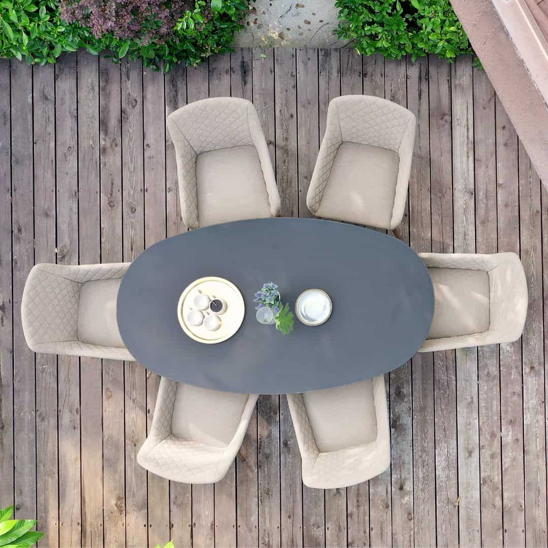 Overhead view of a 6 seat oval dining set with taupe dining chairs #colour_taupe