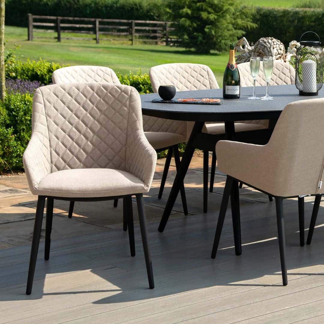 Close up of a taupe fabric dining chair #colour_taupe