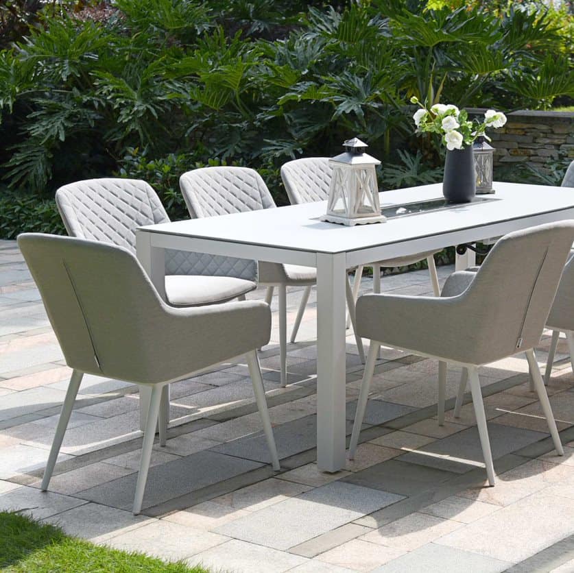 Close up of a light grey fabric dining chairs with a white aluminium frame #colour_lead chine