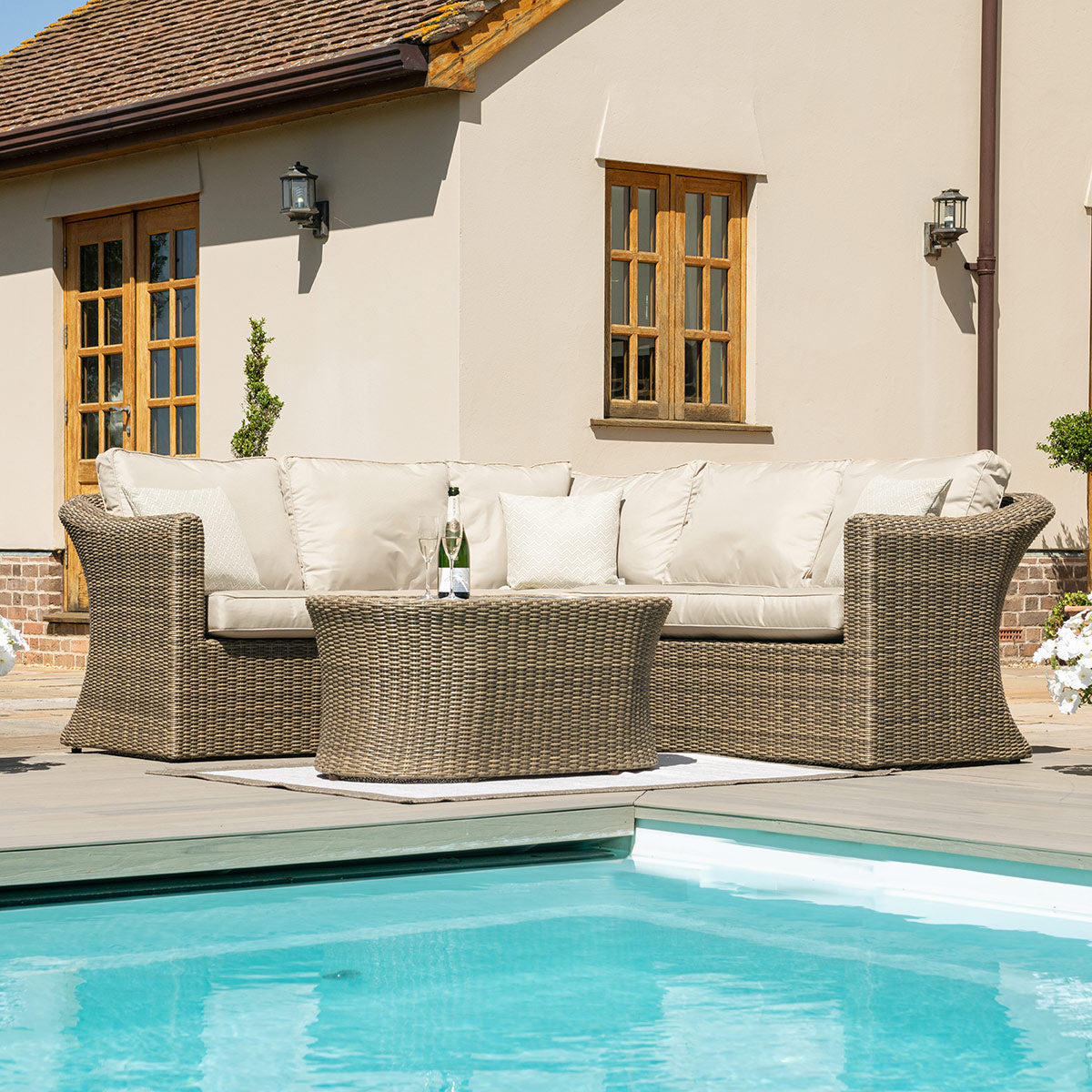 Brown Rattan Small Corner Sofa with Matching Oval Coffee Table