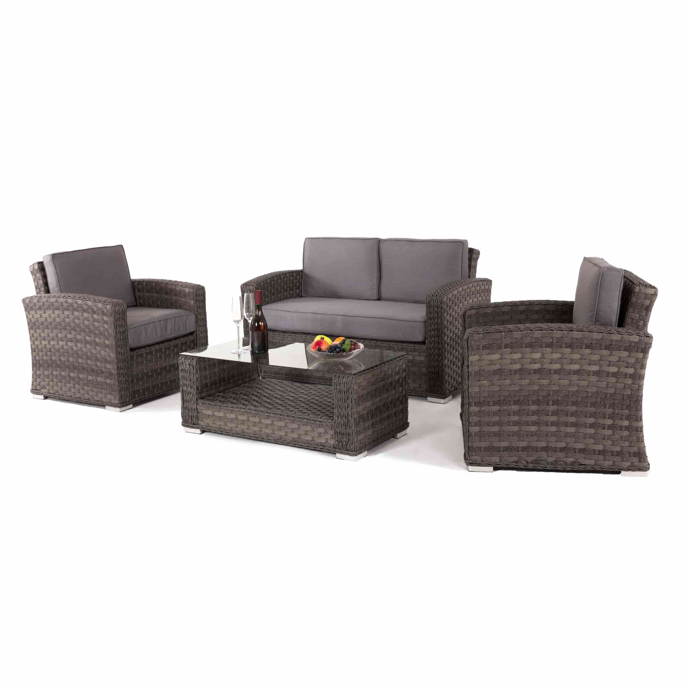 Grey rattan 2 seat sofa set with two armchairs and a matching coffee table with glass table top