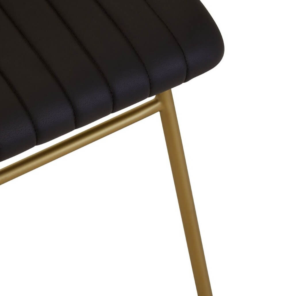 Close up of a seat pad and frame of a dining chair.