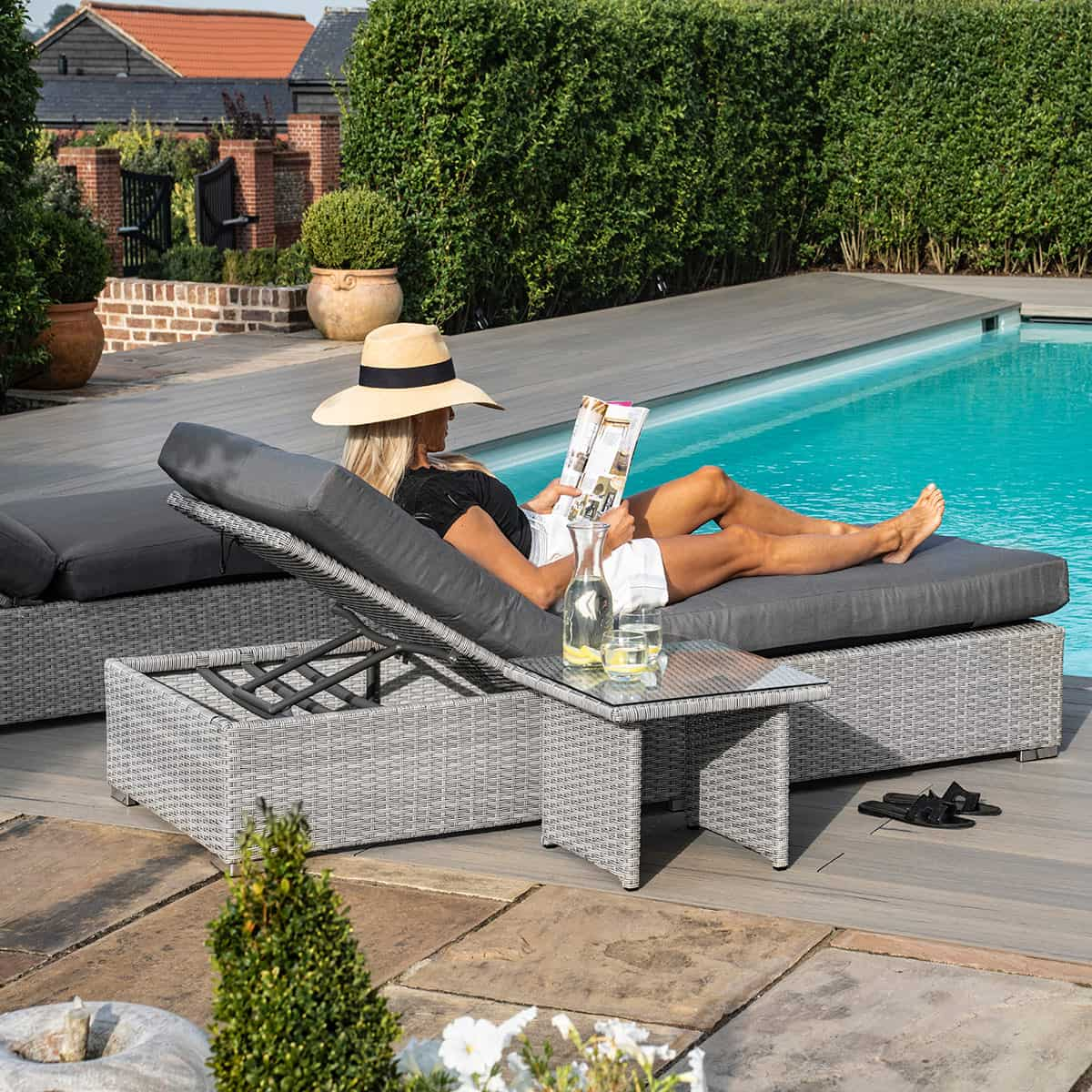 Rattan grey store sun lounger