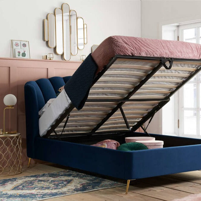Blue fabric ottoman bed