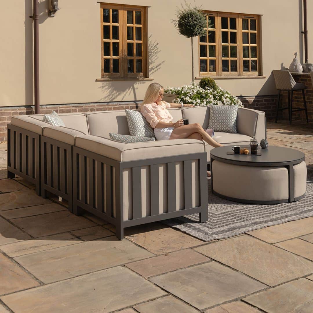 Beige Oatmeal Outdoor Fabric and Grey Powder Coated Aluminium Frame Medium Corner Sofa Set with a Round Coffee Table and 3 Footstools #colour_oatmeal