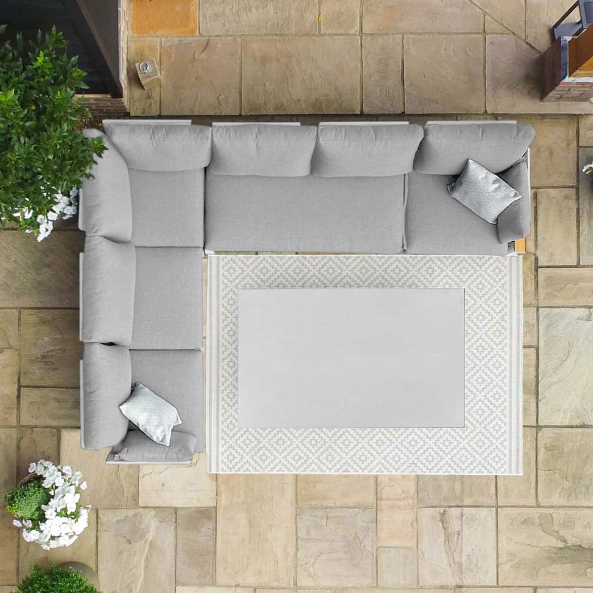 Overhead view of aluminium corner sofa with rectangular rising table #colour_white