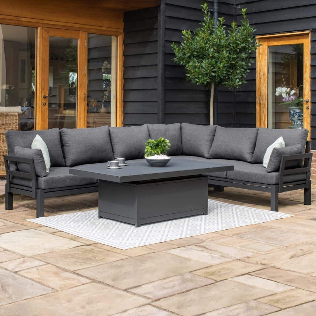 Aluminium corner sofa with rectangular rising table #colour_charcoal