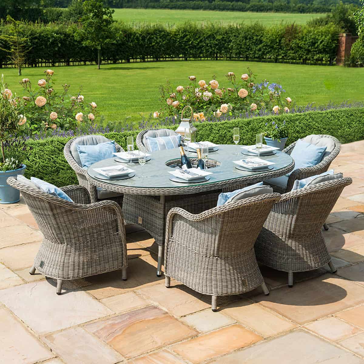 Light grey rattan 6 seat oval ice bucket dining set with heritage chairs