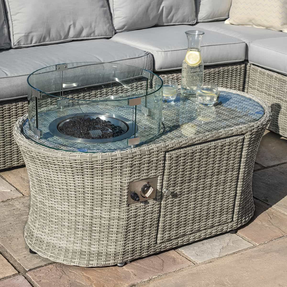 Light grey rattan oval fire pit coffee table